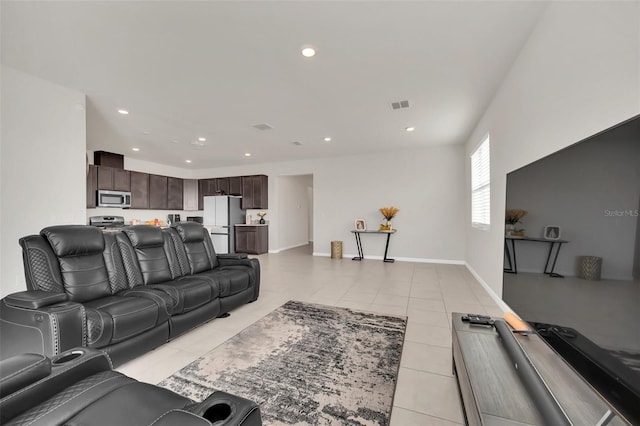 283 Archer Way, Haines City, FL 33844 - living room featuring light tile patterned flooring