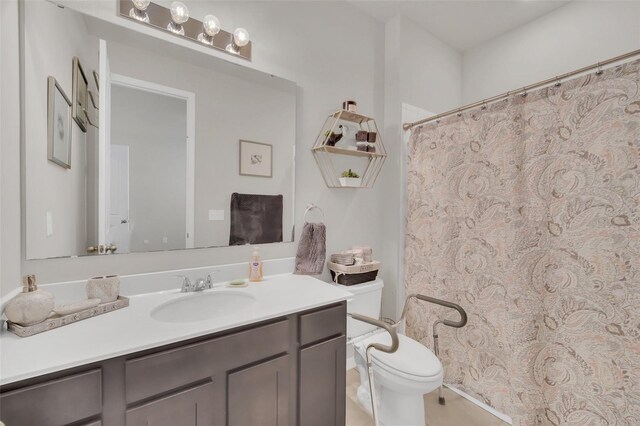 283 Archer Way, Haines City, FL 33844 - bathroom featuring vanity and toilet