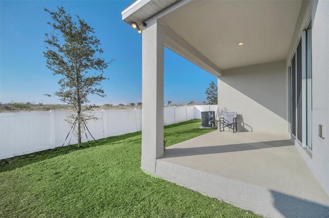 283 Archer Way, Haines City, FL 33844 - view of yard with cooling unit and a patio area