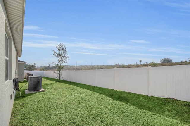283 Archer Way, Haines City, FL 33844 - view of yard featuring central AC