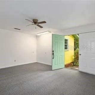 empty room featuring ceiling fan