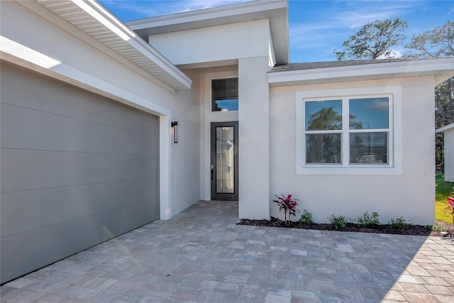 property entrance featuring a garage