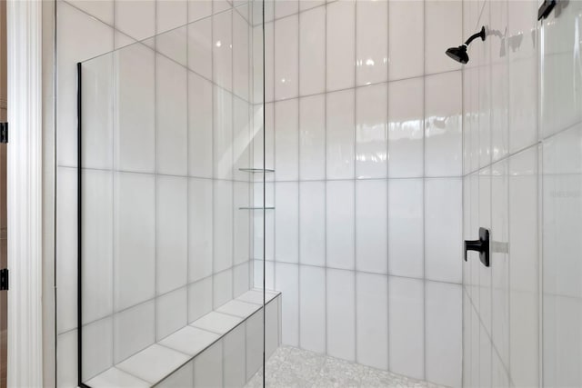 bathroom featuring tiled shower