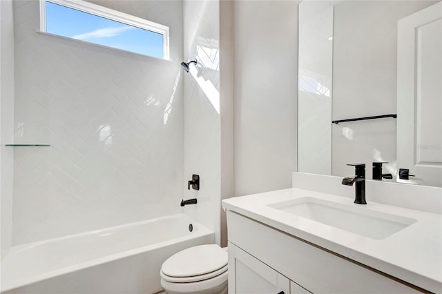 full bathroom featuring vanity, toilet, and tiled shower / bath combo