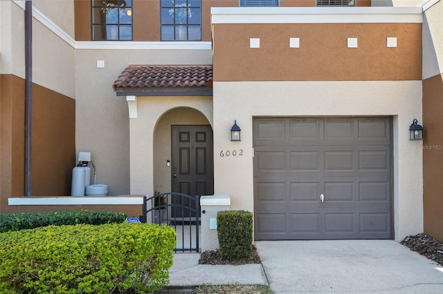 property entrance featuring a garage