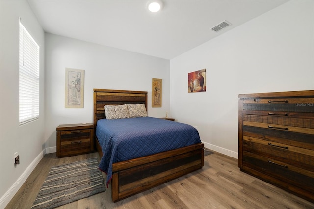 bedroom featuring hardwood / wood-style flooring