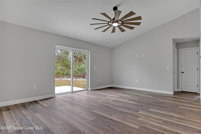 empty room with lofted ceiling, light hardwood / wood-style floors, and ceiling fan