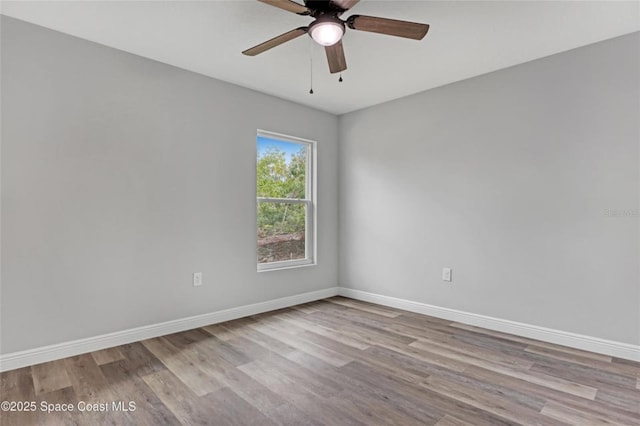 unfurnished room featuring ceiling fan and light hardwood / wood-style floors