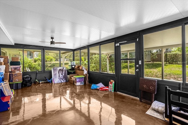 sunroom / solarium with ceiling fan