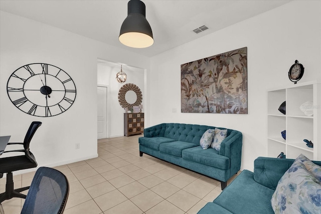 living room with light tile patterned flooring