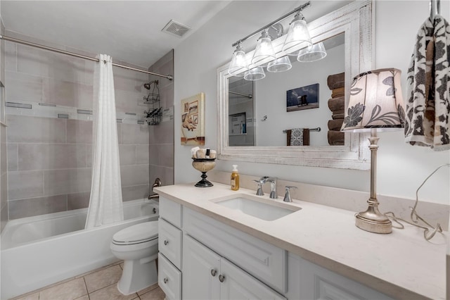 full bathroom with vanity, toilet, tile patterned flooring, and shower / bath combo