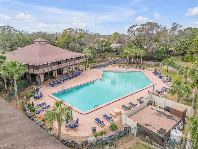 view of swimming pool with a patio area