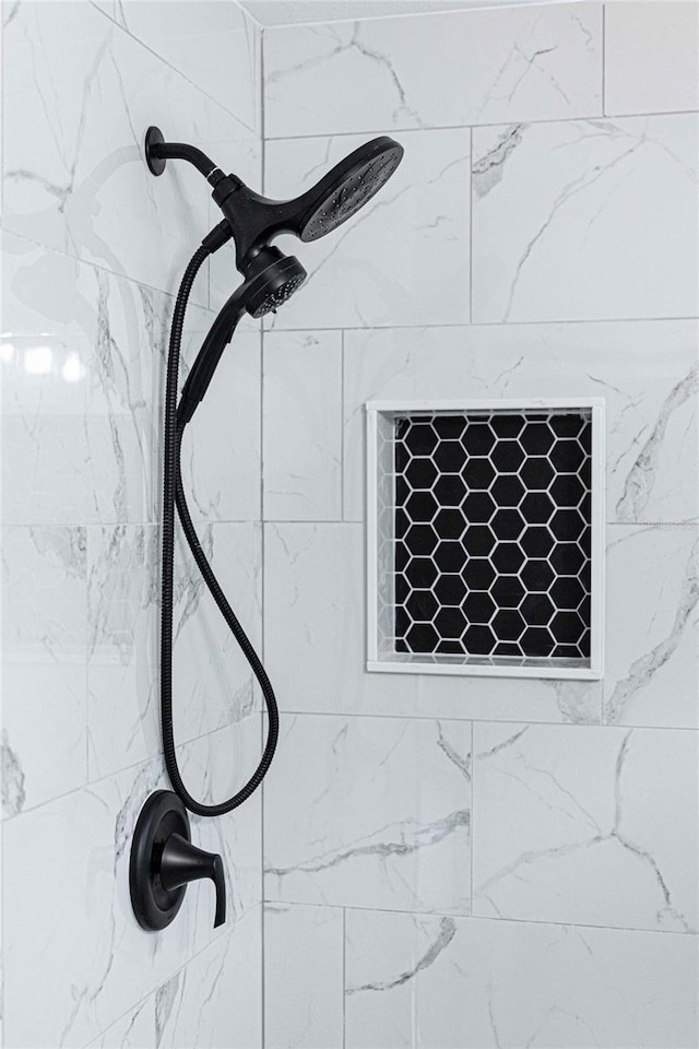 room details with a tile shower