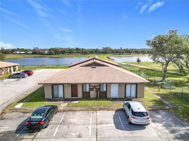 single story home with a water view