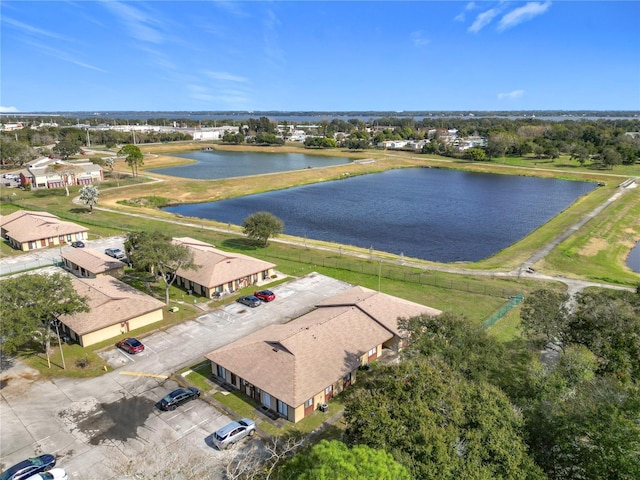 drone / aerial view with a water view