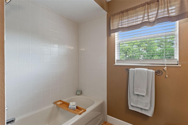 bathroom with a washtub