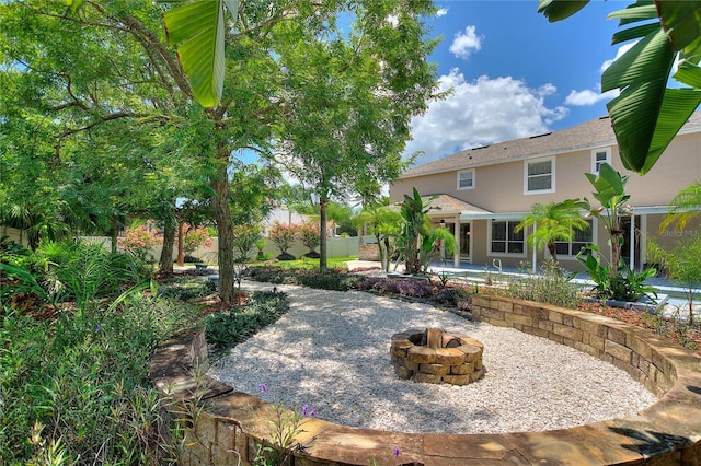 view of patio featuring a fire pit