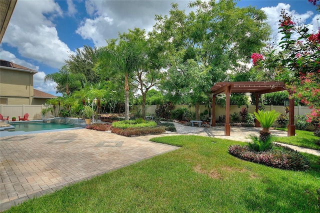 view of yard featuring a fenced in pool, a pergola, and a patio