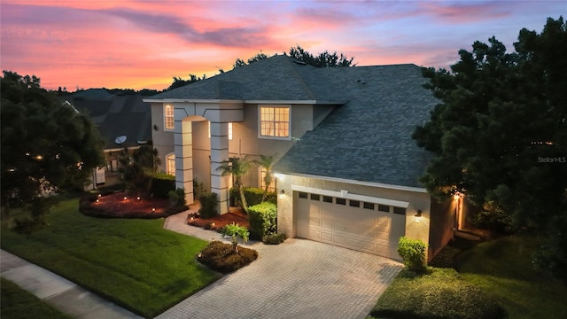 view of property featuring a yard