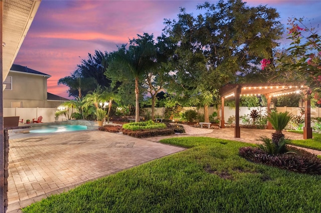 yard at dusk featuring a fenced in pool, a patio, and a pergola