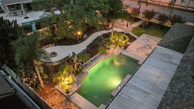 exterior space featuring a patio area and an outdoor fire pit