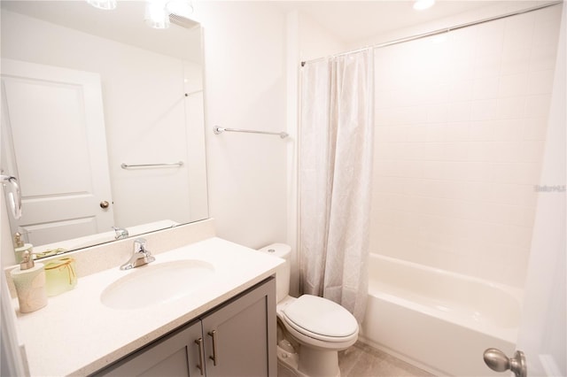 full bathroom featuring vanity, toilet, and shower / bath combo with shower curtain