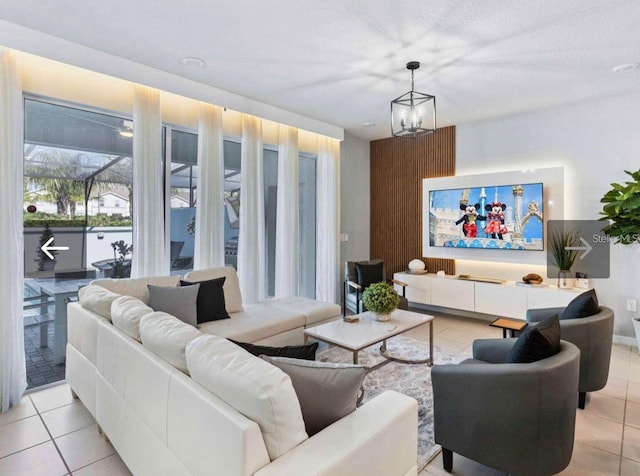 interior space with light tile patterned floors and a notable chandelier