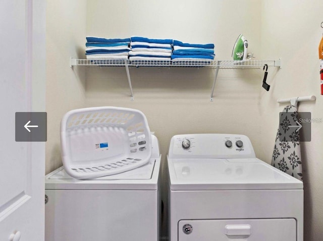 laundry room featuring independent washer and dryer