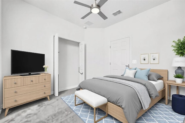 bedroom featuring dark carpet and ceiling fan