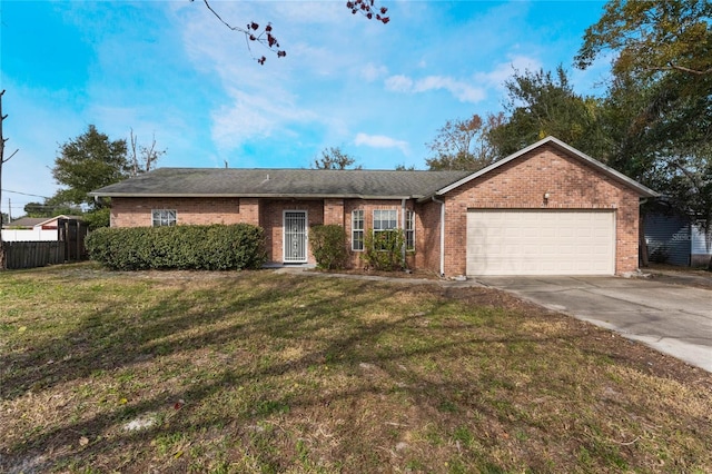 ranch-style home with a garage and a front yard