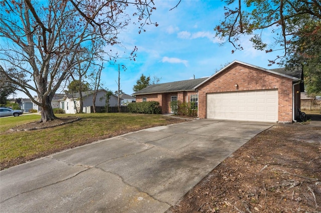 ranch-style house with a garage and a front lawn