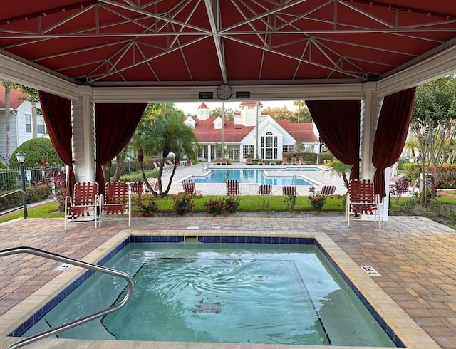 view of pool with a patio area