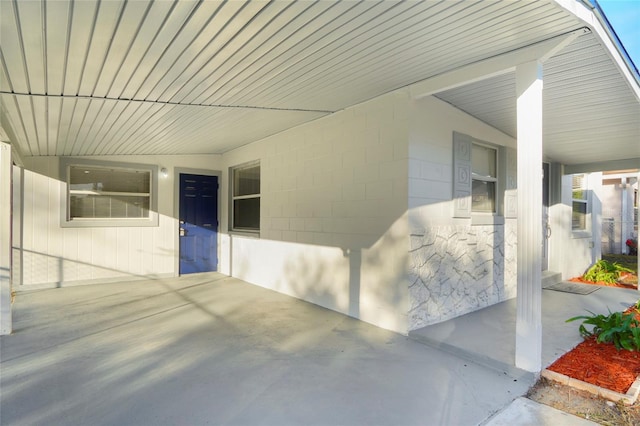 view of patio / terrace featuring a carport