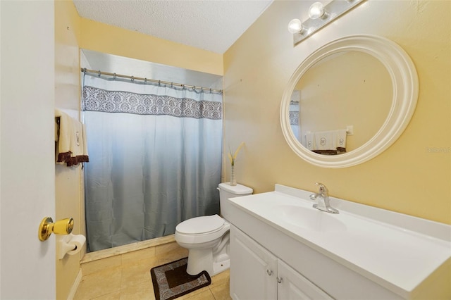 bathroom featuring tile patterned floors, toilet, a textured ceiling, vanity, and a shower with shower curtain