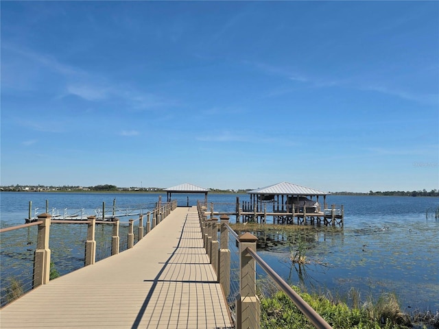 dock area featuring a water view and a gazebo