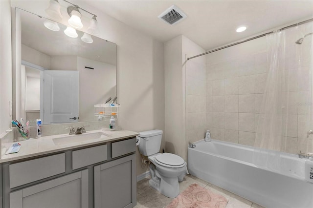 full bathroom featuring shower / bath combination with curtain, vanity, toilet, and tile patterned flooring