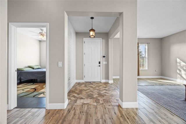 foyer with light wood-type flooring