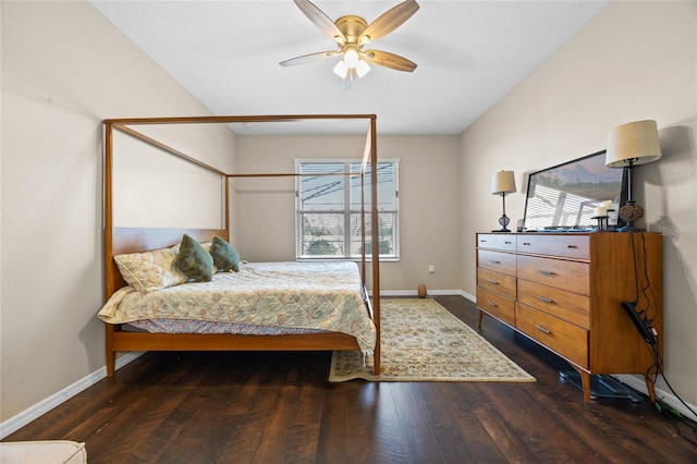 bedroom with ceiling fan and dark hardwood / wood-style flooring