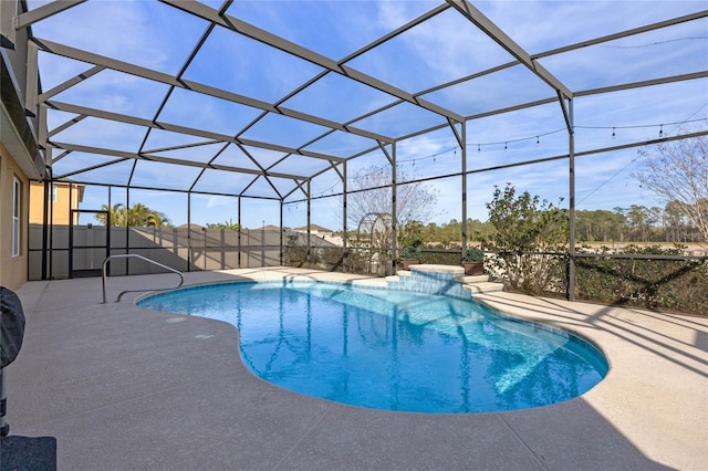 view of pool with a lanai and a patio area