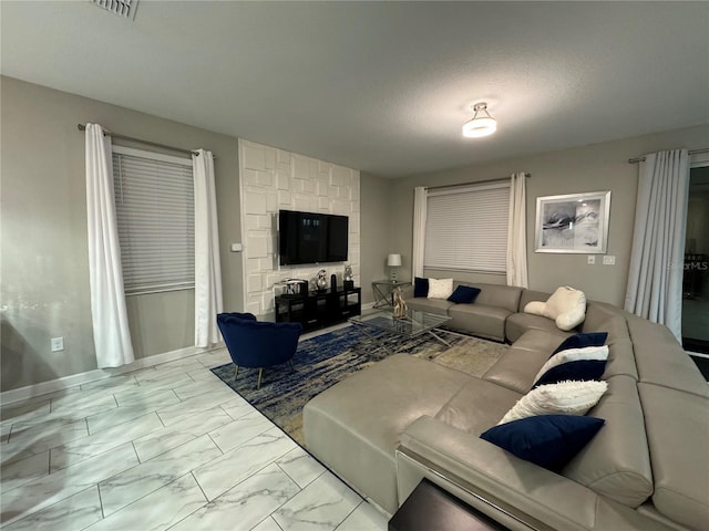 living room with a textured ceiling