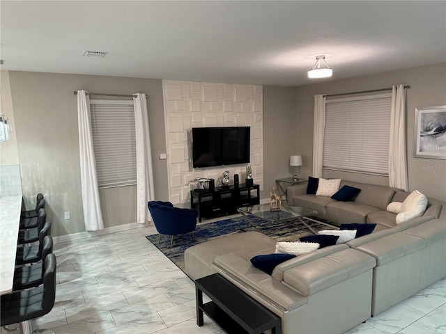 living room featuring a textured ceiling