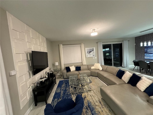 living room with a textured ceiling