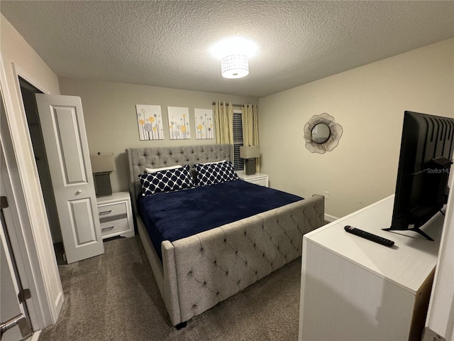 carpeted bedroom with a textured ceiling