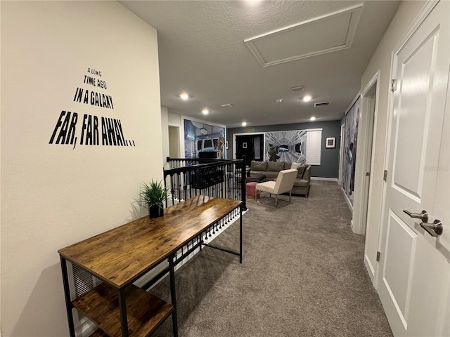 hallway featuring carpet flooring