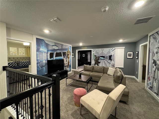 carpeted living room with a textured ceiling