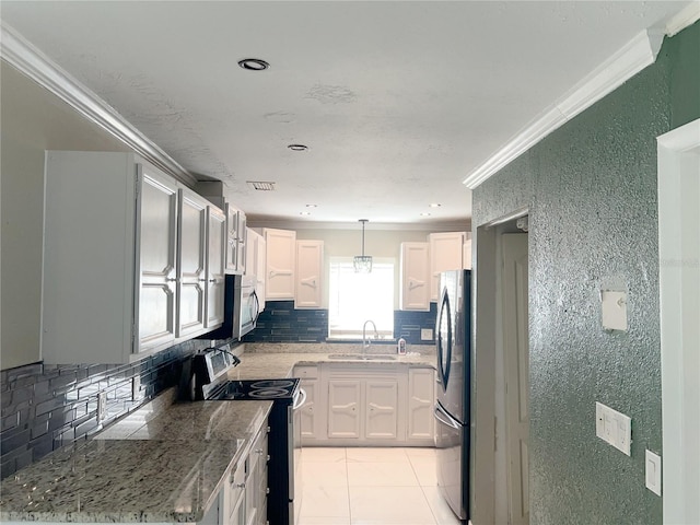 kitchen with white cabinetry, sink, crown molding, and stainless steel appliances