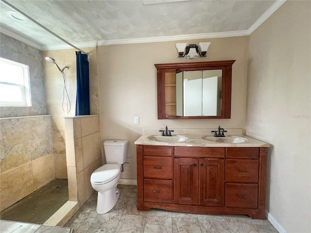 bathroom featuring vanity, curtained shower, ornamental molding, and toilet