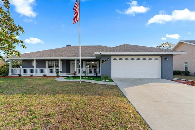 ranch-style home with a porch, a garage, and a front yard