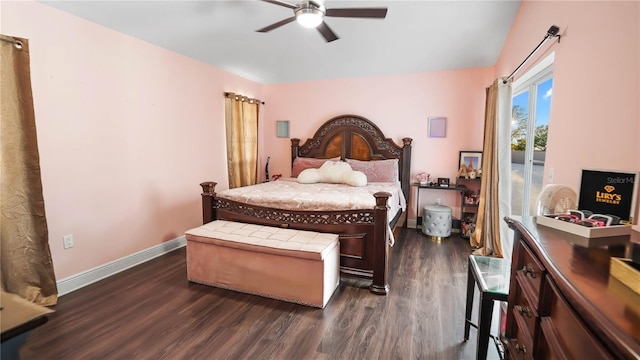 bedroom with dark hardwood / wood-style floors and ceiling fan