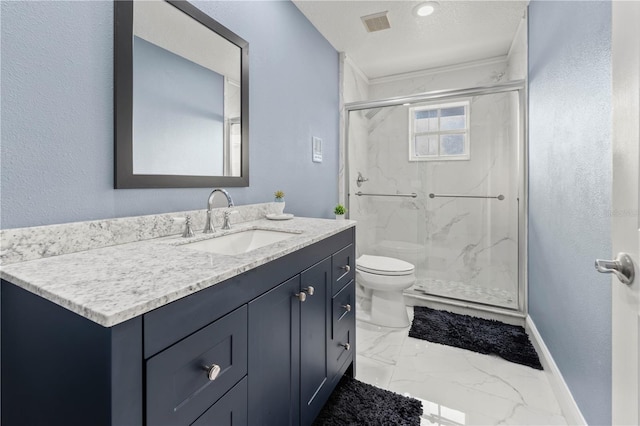 bathroom with vanity, an enclosed shower, a textured ceiling, and toilet